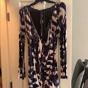 Sexy- low cut and very flattering.